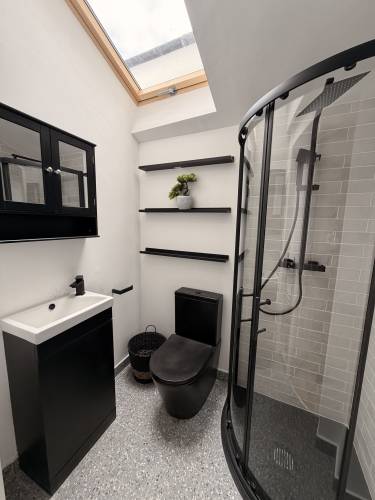 Modern black shower room completed by ZK Plumbing